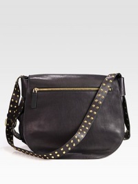 A luxurious leather style with edgy, stud accented details.Adjustable shoulder strapMagnetic snap closure with flapOutside pocketsInside pocketsFully lined13W X 11H X 4¼DMade in Italy A luxurious leather style with edgy, stud accented details.Adjustable shoulder strapMagnetic snap closure with flapOutside pocketsInside pocketsFully lined13W X 11H X 4¼DMade in Italy