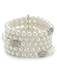 Lauren Ralph Lauren interprets the floral motif in ever-glamorous style with this pearl and crystal stretch bracelet. Lauren Ralph Lauren interprets the floral motif in ever-glamorous style with this pearl and crystal stretch bracelet.
