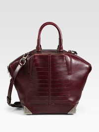 A trapezoid silhouette of sumptuous frenchbull leather, finished with a slotted front and polished hardware.Double top handles, 5 dropDetachable shoulder strap, 28½ dropTop zip closureProtective metal feetOne inside zip pocketOne inside open pocketFully lined11½W X 9½H X 6DImported A trapezoid silhouette of sumptuous frenchbull leather, finished with a slotted front and polished hardware.Double top handles, 5 dropDetachable shoulder strap, 28½ dropTop zip closureProtective metal feetOne inside zip pocketOne inside open pocketFully lined11½W X 9½H X 6DImported