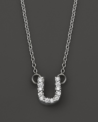 From the Tiny Treasures collection, a diamond U necklace. With signature ruby accent. Designed by Roberto Coin. From the Tiny Treasures collection, a diamond U necklace. With signature ruby accent. Designed by Roberto Coin.