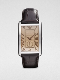 A classic timepiece in sleek stainless steel and luxurious crocodile embossed leather. Quartz movementWater resistant to 5 ATMRectangular stainless steel case, 31.5mm (1.2) X 39mm (1.5)Smooth bezelSilvertone dial with amber-colored crystalRoman numeral hour markersSecond hand sub-dialBrown crocodile embossed leather strapImported A classic timepiece in sleek stainless steel and luxurious crocodile embossed leather. Quartz movementWater resistant to 5 ATMRectangular stainless steel case, 31.5mm (1.2) X 39mm (1.5)Smooth bezelSilvertone dial with amber-colored crystalRoman numeral hour markersSecond hand sub-dialBrown crocodile embossed leather strapImported