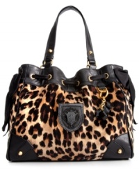 For the love of leopard, this plush velour design from Juicy Couture adds instant allure to any ensemble. Featuring luxe leather handles, golden stud accents and flirty drawstring bows, it's easy to see why this look is so purr-fect. For the love of leopard, this plush velour design from Juicy Couture adds instant allure to any ensemble. Featuring luxe leather handles, golden stud accents and flirty drawstring bows, it's easy to see why this look is so purr-fect.