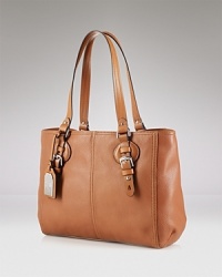 Perfect for carrying the daytime essentials, Lauren Ralph Lauren's signature leather tote perfectly shows off the label's imitable fusion of fashion and function. Perfect for carrying the daytime essentials, Lauren Ralph Lauren's signature leather tote perfectly shows off the label's imitable fusion of fashion and function.
