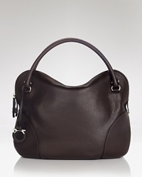 A sleek, chic leather hobo with contemporary panel details and a clever lockable top zip. By Salvatore Ferragamo. A sleek, chic leather hobo with contemporary panel details and a clever lockable top zip. By Salvatore Ferragamo.