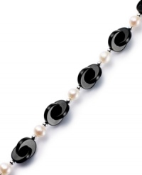 Striking contrast. Overlapping onyx discs (12 mm) combine with cultured freshwater pearls (6-1/2-7 mm) for a bold and elegant look. Set in sterling silver. Approximate length: 7-1/2 inches. Striking contrast. Overlapping onyx discs (12 mm) combine with cultured freshwater pearls (6-1/2-7 mm) for a bold and elegant look. Set in sterling silver. Approximate length: 7-1/2 inches.