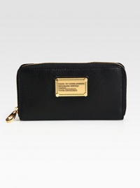 Sleek and polished, this silhouette of super-soft leather will keep your essentials organized in style. Zip-around closureOne inner zip coin compartmentThree open billfoldsNine credit card slotsFully lined7¼W X 3¾H X ¾DImported Sleek and polished, this silhouette of super-soft leather will keep your essentials organized in style. Zip-around closureOne inner zip coin compartmentThree open billfoldsNine credit card slotsFully lined7¼W X 3¾H X ¾DImported