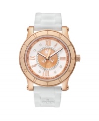 Perfectly suited for Her Royal Highness. HRH watch by Juicy Couture crafted of white silicone bracelet and round rose gold-plated stainless steel case with logo-etched bezel. White dial with inner textured rose gold tone dial crystallized with Swarovski elements features rose gold tone Roman numerals, minute track, luminous hands and iconic crown logo. Quartz movement. Water resistant to 30 meters. Two-year limited warranty. Perfectly suited for Her Royal Highness. HRH watch by Juicy Couture crafted of white silicone bracelet and round rose gold-plated stainless steel case with logo-etched bezel. White dial with inner textured rose gold tone dial crystallized with Swarovski elements features rose gold tone Roman numerals, minute track, luminous hands and iconic crown logo. Quartz movement. Water resistant to 30 meters. Two-year limited warranty.