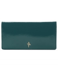 Understated, elegant and impossibly chic, this slender leather silhouette from Cole Haan perfectly pairs with your favorite satchel or tote. The well-organized interior is outfitted with plenty of compartments, while the outside is accented with the Cole Haan heritage logo on the flap. Understated, elegant and impossibly chic, this slender leather silhouette from Cole Haan perfectly pairs with your favorite satchel or tote. The well-organized interior is outfitted with plenty of compartments, while the outside is accented with the Cole Haan heritage logo on the flap.