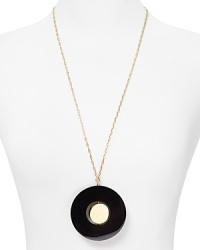 It's concentric. This kate spade new york piece bedecks the neck in circular logic, cast in plated gold and accented by a shapely pendant. It's concentric. This kate spade new york piece bedecks the neck in circular logic, cast in plated gold and accented by a shapely pendant.