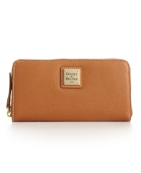 Keep things organized with a sophisticated wallet from Dooney & Bourke. An iconic signature plaque and goldtone hardware accent this staple design for year-round appeal. Keep things organized with a sophisticated wallet from Dooney & Bourke. An iconic signature plaque and goldtone hardware accent this staple design for year-round appeal.