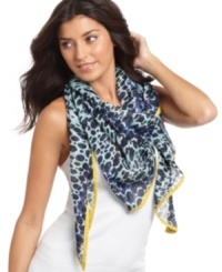 Bold color and an even bolder pattern. Layer on this Nine West triangle scarf as a light layer with heavy impact. Bold color and an even bolder pattern. Layer on this Nine West triangle scarf as a light layer with heavy impact.