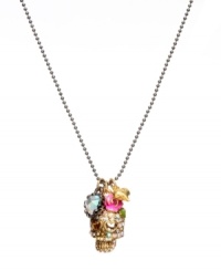 Traditional Mexican folk art gets the glam touch from Betsey Johnson. Crystal-accented skull pendant with heart-shaped eyes accented by pink enamel flower, goldtone heart and clear crystal charms. Crafted in antique gold-plated mixed metal. Approximate length: 16 inches + 3-inch extender. Approximate drop: 3/4 inch. Comes with pink leopard gift box. Traditional Mexican folk art gets the glam touch from Betsey Johnson. Crystal-accented skull pendant with heart-shaped eyes accented by pink enamel flower, goldtone heart and clear crystal charms. Crafted in antique gold-plated mixed metal. Approximate length: 16 inches + 3-inch extender. Approximate drop: 3/4 inch. Comes with pink leopard gift box.