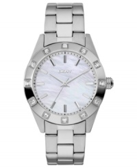 A classic, structured watch design from DKNY with a soothing mother-of-pearl dial. A classic, structured watch design from DKNY with a soothing mother-of-pearl dial.
