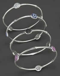 Three sparkling stations add brilliant color to this slim, elegant sterling silver bangle. Three sparkling stations add brilliant color to this slim, elegant sterling silver bangle.