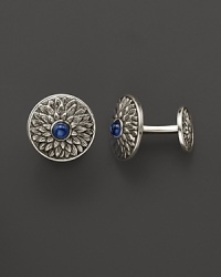 Elegant, intricately textured sterling silver cufflinks, set with sapphires, from Buccellati. Elegant, intricately textured sterling silver cufflinks, set with sapphires, from Buccellati.