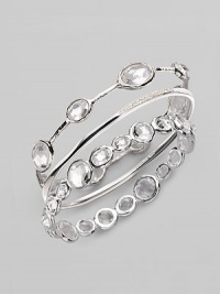 From the Paparazzi Collection. Ovals of faceted clear quartz shimmer within a bangle of polished sterling silver. Clear quartz Sterling silver Diameter, about 2¾ Imported Please note: Bracelets sold separately. From the Paparazzi Collection. Ovals of faceted clear quartz shimmer within a bangle of polished sterling silver. Clear quartz Sterling silver Diameter, about 2¾ Imported Please note: Bracelets sold separately.