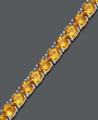 Add new light to your look with punch-bright color. Bracelet features a sunny row of round-cut citrine (17 ct. t.w.) set in smooth sterling silver. Approximate length: 7 inches. Add new light to your look with punch-bright color. Bracelet features a sunny row of round-cut citrine (17 ct. t.w.) set in smooth sterling silver. Approximate length: 7 inches.