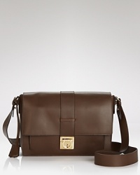 Luxurious Italian leather and a decidedly chic shape; it's a modern update to the mini bag that styles your look sophisticated. From Salvatore Ferragamo. Luxurious Italian leather and a decidedly chic shape; it's a modern update to the mini bag that styles your look sophisticated. From Salvatore Ferragamo.