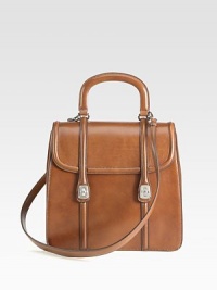Leather bag with flap closure.Top handle, 4½ dropDetachable shoulder strap, 19½ dropTurnlock flap closureThree inner compartmentsOne inside zip pocketThree inside open pocketsSatin lining11W X 10½H X 5¾DMade in Italy Leather bag with flap closure.Top handle, 4½ dropDetachable shoulder strap, 19½ dropTurnlock flap closureThree inner compartmentsOne inside zip pocketThree inside open pocketsSatin lining11W X 10½H X 5¾DMade in Italy