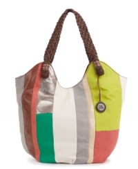 The Sak contrasts the rich leather body on their hold-it-all Indio Leather tote with tactile, woven handles. The Sak contrasts the rich leather body on their hold-it-all Indio Leather tote with tactile, woven handles.