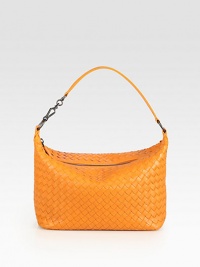 Iconic woven leather design with a single shoulder strap has gunmetal hardware and a supple suede lining. Single shoulder strap, 7 drop Zipper closure Suede lining 10W X 6H X 5½D Made in Italy Iconic woven leather design with a single shoulder strap has gunmetal hardware and a supple suede lining. Single shoulder strap, 7 drop Zipper closure Suede lining 10W X 6H X 5½D Made in Italy