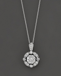 An elegant diamond pendant necklace in white gold with a vintage feel. An elegant diamond pendant necklace in white gold with a vintage feel.