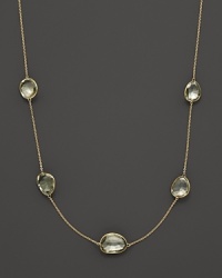 Five stations of faceted green amethyst gleam in 14K. yellow gold settings. Five stations of faceted green amethyst gleam in 14K. yellow gold settings.
