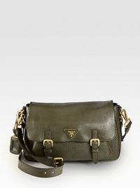 Crossbody design of supple leather with metal logo and hardware.Detachable adjustable shoulder strap, 20-22 dropBuckled flap closureOne outside open pocketOne open pocket under flapOne inside zip pocketOne inside open pocketSignature jacquard lining13W X 7½H X 4DMade in Italy Crossbody design of supple leather with metal logo and hardware.Detachable adjustable shoulder strap, 20-22 dropBuckled flap closureOne outside open pocketOne open pocket under flapOne inside zip pocketOne inside open pocketSignature jacquard lining13W X 7½H X 4DMade in Italy