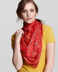 Make an elegant statement with a floral and Gancini printed silk scarf from Salvatore Ferragamo. Make an elegant statement with a floral and Gancini printed silk scarf from Salvatore Ferragamo.