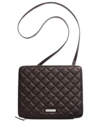 On the go? Keep you digital device in check with this travel-ready iPad case from Calvin Klein. Crafted in rich leather with padded interior and convenient crossbody strap, it's totally tech-friendly. On the go? Keep you digital device in check with this travel-ready iPad case from Calvin Klein. Crafted in rich leather with padded interior and convenient crossbody strap, it's totally tech-friendly.