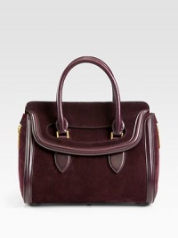 An elegant style in soft suede accented in smooth leather with expandable side zippers.Double leather top handles, 4¼ dropFlap closureProtective metal feetOne inside zip pocketTwo inside open pocketsLeather lining12W X 11½H X 3½DMade in Italy An elegant style in soft suede accented in smooth leather with expandable side zippers.Double leather top handles, 4¼ dropFlap closureProtective metal feetOne inside zip pocketTwo inside open pocketsLeather lining12W X 11½H X 3½DMade in Italy