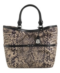 This take-anywhere tote by Cole Haan will get you where you need to go in style. A sleek python print and shiny silvetone hardware give this tote the right look for the office, happy hour or weekend adventure. This take-anywhere tote by Cole Haan will get you where you need to go in style. A sleek python print and shiny silvetone hardware give this tote the right look for the office, happy hour or weekend adventure.