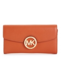 This luxe, refined wallet by Michael Kors creates a gorgeous city-chic style for the modern girl-on-the-go. Simple signature detail and a soft textured exterior keep this wallet perfectly posh. This luxe, refined wallet by Michael Kors creates a gorgeous city-chic style for the modern girl-on-the-go. Simple signature detail and a soft textured exterior keep this wallet perfectly posh.