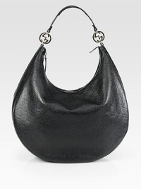 Large, leather bag in an interlocking logo pattern with nickel hardware and a single shoulder strap. Shoulder strap, 8 drop Zipper closure Inside zip pocket Two open pockets Fully lined 15W X 11¾H X 6D Made in Italy Large, leather bag in an interlocking logo pattern with nickel hardware and a single shoulder strap. Shoulder strap, 8 drop Zipper closure Inside zip pocket Two open pockets Fully lined 15W X 11¾H X 6D Made in Italy