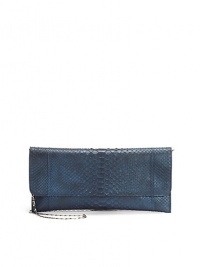 THE LOOKTuck-away shoulder chainEnvelope silhouetteMagnetic flap closureOne inside zip pocketInside logo detailTHE MEASUREMENTShoulder chain, 14 drop12W X 5½H X ¼DTHE MATERIALPythonLeather and printed fabric liningORIGINMade in USA THE LOOKTuck-away shoulder chainEnvelope silhouetteMagnetic flap closureOne inside zip pocketInside logo detailTHE MEASUREMENTShoulder chain, 14 drop12W X 5½H X ¼DTHE MATERIALPythonLeather and printed fabric liningORIGINMade in USA