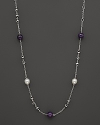 This sterling silver necklace, gleaming with amethysts and freshwater pearls, makes an elegant statement. By Di MODOLO. This sterling silver necklace, gleaming with amethysts and freshwater pearls, makes an elegant statement. By Di MODOLO.
