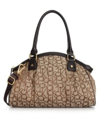 Signature jacquard and gleaming goldtone hardware lend a luxe look to this chic satchel from Calvin Klein. Its spacious interior offers plenty of room to stow wallet, phone, makeup case and any other little essentials you can't leave home without. Signature jacquard and gleaming goldtone hardware lend a luxe look to this chic satchel from Calvin Klein. Its spacious interior offers plenty of room to stow wallet, phone, makeup case and any other little essentials you can't leave home without.