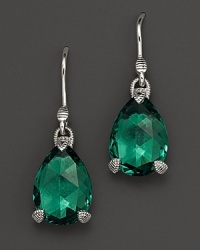 Faceted, pear-cut green quartz drops, set in sterling silver, make a classic style statement. Faceted, pear-cut green quartz drops, set in sterling silver, make a classic style statement.