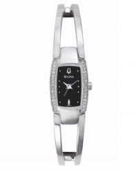 A sleek, open-work bangle with a sparkling crystal bezel radiates supreme sophistication. Silvertone bangle. Water resistant up to 30 meters. Three-year limited warranty. A sleek, open-work bangle with a sparkling crystal bezel radiates supreme sophistication. Silvertone bangle. Water resistant up to 30 meters. Three-year limited warranty.