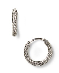 Nadri small pave huggie hoop earrings. Crystal huggie hoop earrings with hinge clasp closure for pierced ears. 0.47 ct. t.w. Nadri small pave huggie hoop earrings. Crystal huggie hoop earrings with hinge clasp closure for pierced ears. 0.47 ct. t.w.
