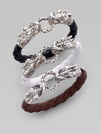 From the Naga Collection. Symbolizing power and the life force in many cultures, two richly detailed sterling silver dragon heads, joined by a bracelet of braided leather, play tug of war with a braided ring clasp. Sterling silver Woven leather Diameter, about 2¼ Width, about ¼ Dragon spring clasp Made in Bali Please note: Bracelets sold separately. From the Naga Collection. Symbolizing power and the life force in many cultures, two richly detailed sterling silver dragon heads, joined by a bracelet of braided leather, play tug of war with a braided ring clasp. Sterling silver Woven leather Diameter, about 2¼ Width, about ¼ Dragon spring clasp Made in Bali Please note: Bracelets sold separately.