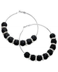 Refined elegance. This pair of clutchless hoop earrings from GUESS is crafted from silver-tone mixed metal with glass crystals and jet fireball beads adding a fashionable touch. Approximate diameter: 2-1/2 inches. Refined elegance. This pair of clutchless hoop earrings from GUESS is crafted from silver-tone mixed metal with glass crystals and jet fireball beads adding a fashionable touch. Approximate diameter: 2-1/2 inches.