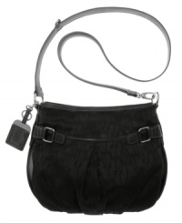 This classic signature hobo by Tagnanello easily transcends seasons with its fresh, timeless appeal. A double entry design brings top functionality to this beautiful design, with both zipper top and magnetic snap pockets at top. Polished silvertone hardware and a detachable bag tag complete this look. This classic signature hobo by Tagnanello easily transcends seasons with its fresh, timeless appeal. A double entry design brings top functionality to this beautiful design, with both zipper top and magnetic snap pockets at top. Polished silvertone hardware and a detachable bag tag complete this look.