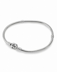 PANDORA's iconic bracelet in gleaming sterling silver. Make it uniquely yours with a combination of beautiful charms and clips. PANDORA's iconic bracelet in gleaming sterling silver. Make it uniquely yours with a combination of beautiful charms and clips.