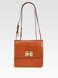 Sleek, sumptuous leather in a structured flap-front silhouette with polished turnlock hardware.Adjustable shoulder straps, 9¾-20 dropTurnlock flap closureOne outside open pocketThree inner compartmentsOne inside zip pocketLeather lining9W X 8H X 3½DMade in Italy Sleek, sumptuous leather in a structured flap-front silhouette with polished turnlock hardware.Adjustable shoulder straps, 9¾-20 dropTurnlock flap closureOne outside open pocketThree inner compartmentsOne inside zip pocketLeather lining9W X 8H X 3½DMade in Italy