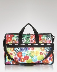 LeSportsac's signature nylon duffel is ready for travels, featuring a durable design, plenty of pockets and a cute print. It's totally ready for takeoff. LeSportsac's signature nylon duffel is ready for travels, featuring a durable design, plenty of pockets and a cute print. It's totally ready for takeoff.
