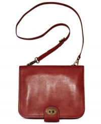 Treat your technology to vintage style with this travel-ready portfolio from Fossil. Crafted from supple leather with signature hardware, its versatile crossbody strap keeps hands free for hailing a cab while holding a cup of morning Joe. Treat your technology to vintage style with this travel-ready portfolio from Fossil. Crafted from supple leather with signature hardware, its versatile crossbody strap keeps hands free for hailing a cab while holding a cup of morning Joe.