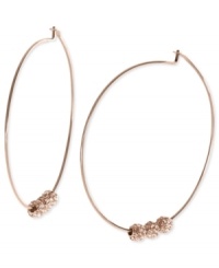 Michael Kors adds an elegant touch to its pair of hoop earrings. Crafted from rose gold ion-plated mixed metal, the earrings feature glass pave fireballs for a lustrous touch. Approximate diameter: 2 inches. Michael Kors adds an elegant touch to its pair of hoop earrings. Crafted from rose gold ion-plated mixed metal, the earrings feature glass pave fireballs for a lustrous touch. Approximate diameter: 2 inches.