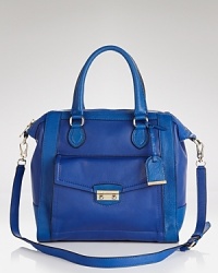 City savvy with style to spare. This Cole Haan satchel is everything we need (and want) in a day bag, crafted of leather with a versatile dual function design. City savvy with style to spare. This Cole Haan satchel is everything we need (and want) in a day bag, crafted of leather with a versatile dual function design.