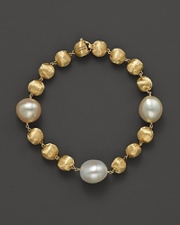 Softly-hued freshwater pearls mingle with textured beads of 18K yellow gold. Exclusively at Bloomingdale's from the Marco Bicego Africa Pearl Collection. Softly-hued freshwater pearls mingle with textured beads of 18K yellow gold. Exclusively at Bloomingdale's from the Marco Bicego Africa Pearl Collection.